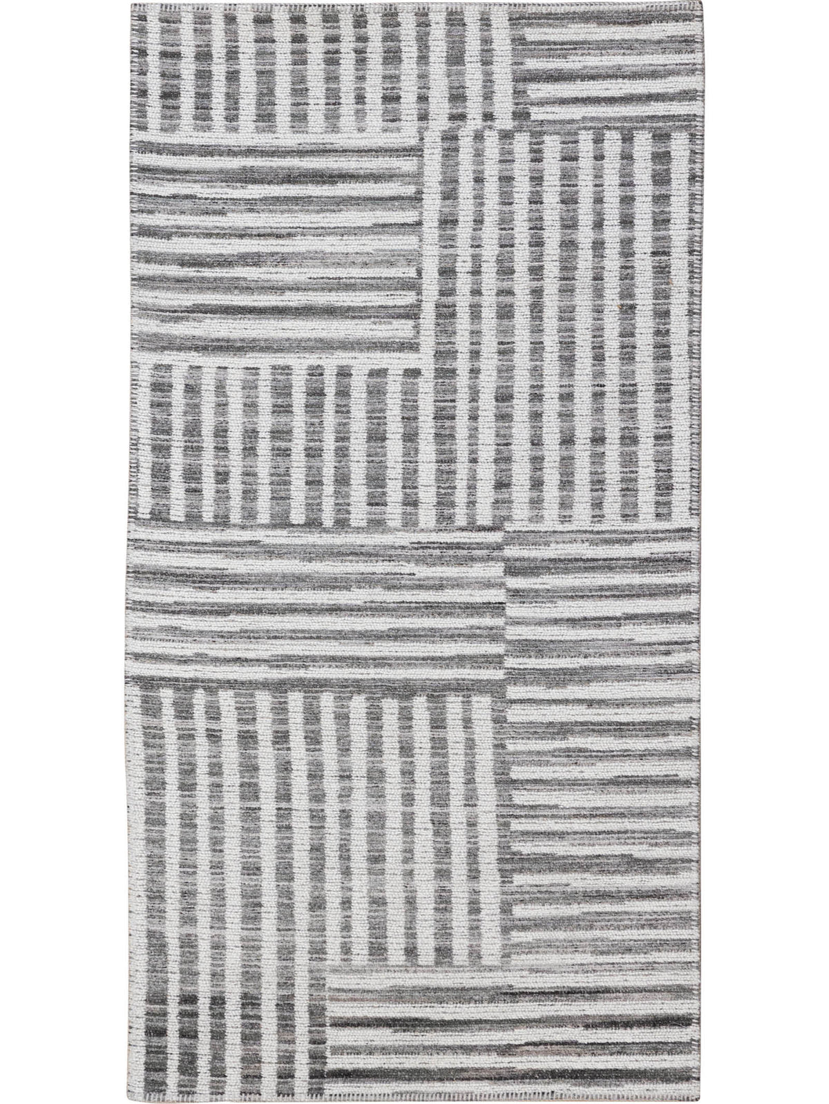 Gray and white geometric patterned rug 