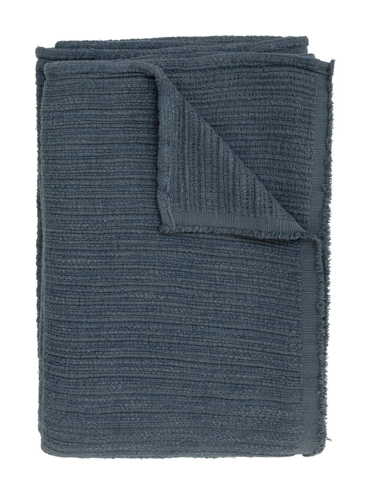 A folded dark slate blue ribbed knit blanket or throw