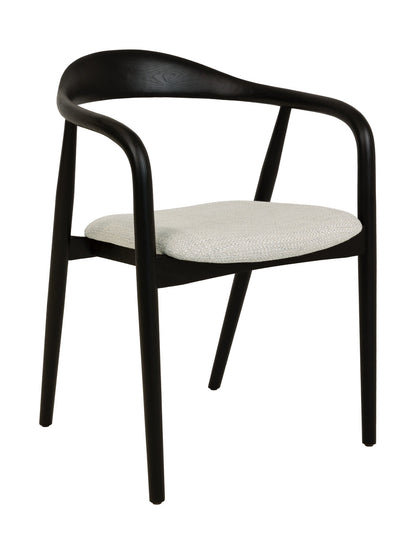 Modern chair with black frame and white cushion 