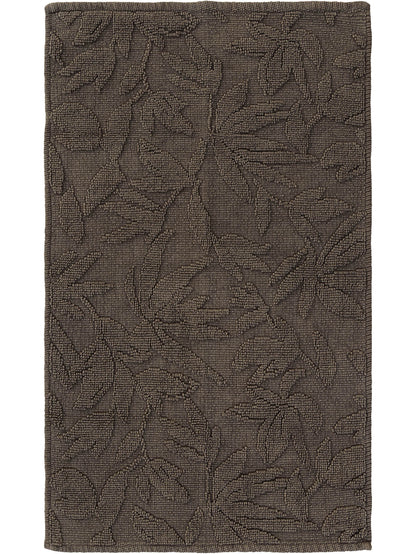 Textured brown bathmat with leaf pattern 