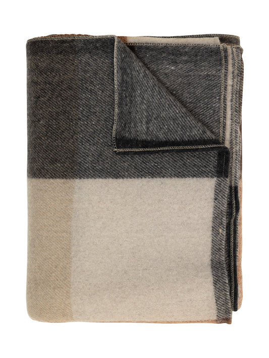 Folded blue, red and beige blanket 