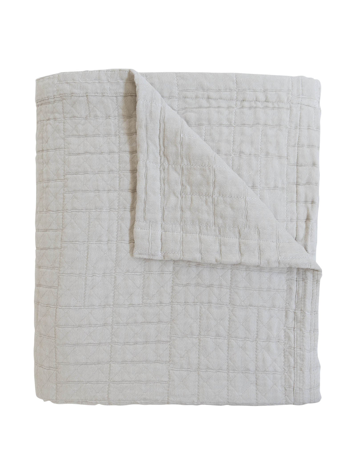 Folded light gray quilt 