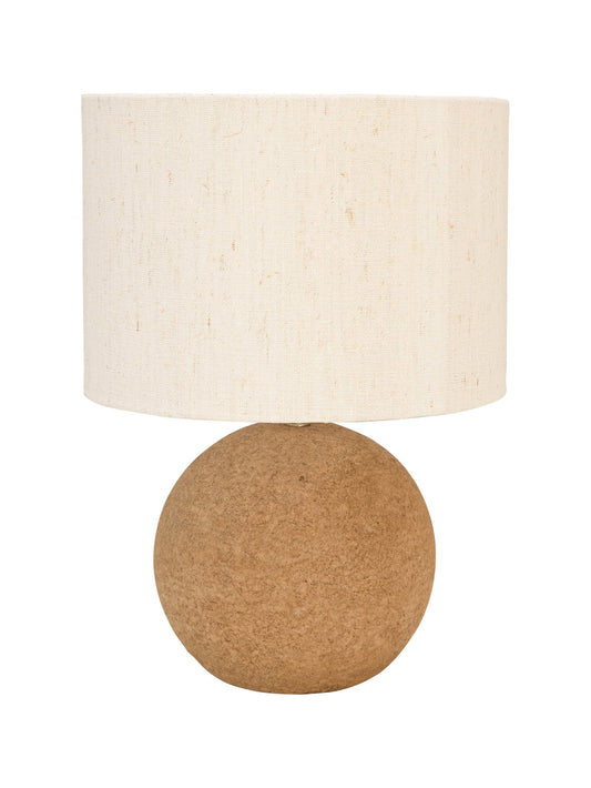 Table lamp with fabric shade and spherical base made of recycled materials.