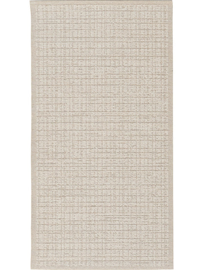 Textured beige rug that is fully outdoor